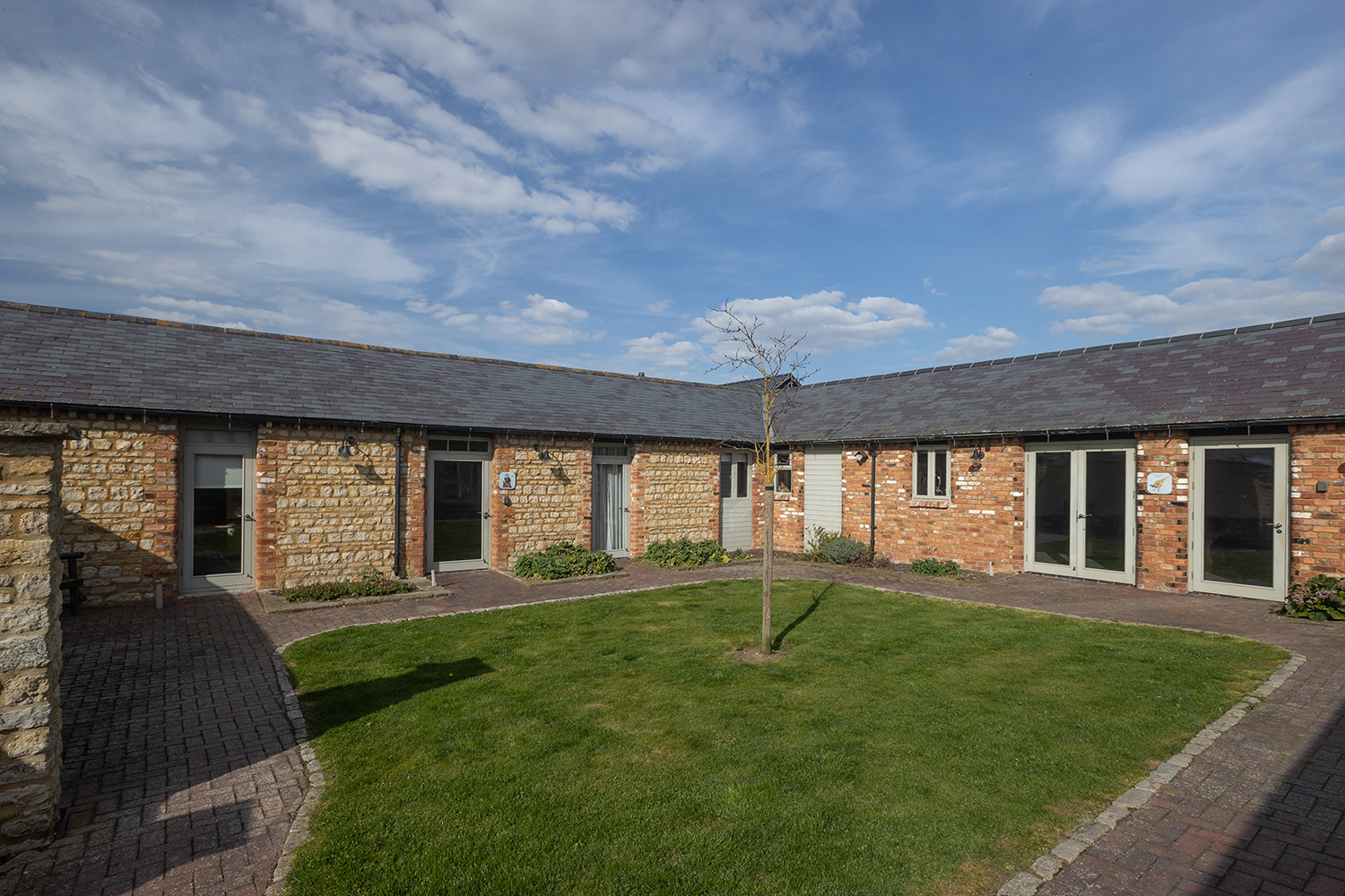 grass area and cottage