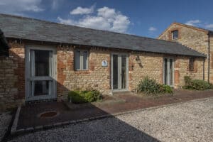 side view and stones outside cottage